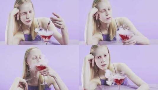 令人毛骨悚然的年轻女子准备血液饮料高清在线视频素材下载