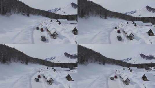 航拍冬季新疆阿勒泰禾木雪景雪山森林村落高清在线视频素材下载