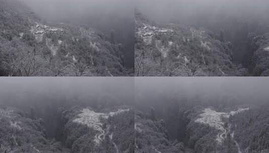 6K雾雪中的张家界山顶村庄空中田园高清在线视频素材下载
