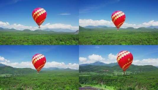 飞在蓝天里的热气球高清在线视频素材下载