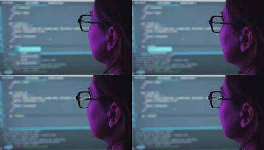 女人在屏幕前开发代码高清在线视频素材下载