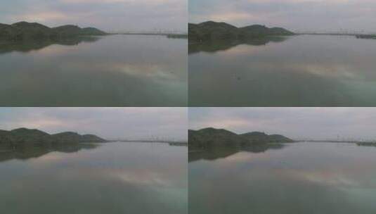航拍武汉东湖磨山傍晚飞鸟高清在线视频素材下载