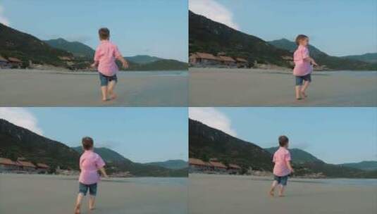 的孩子沿着海滩奔跑高清在线视频素材下载