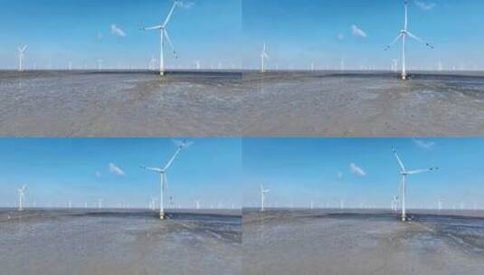 海滩上的风能风力发电场风车航拍高清在线视频素材下载