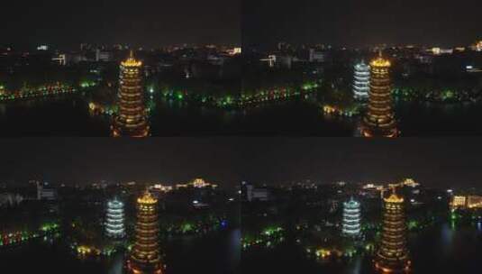 航拍广西桂林地标日月双塔夜景高清在线视频素材下载