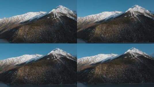 雪山视频青藏高原蓝天下雪山森林高清在线视频素材下载