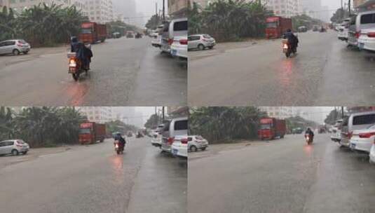 大雨倾盆水漫路面高清在线视频素材下载