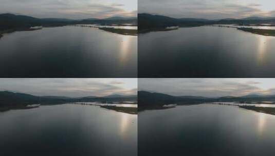 云南旅游风光视频夕阳下高原湿地湖泊高清在线视频素材下载