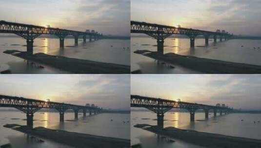 九江长江大桥日出航拍视频，一列火车通过高清在线视频素材下载