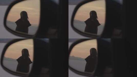 汽车反光镜里的女人高清在线视频素材下载