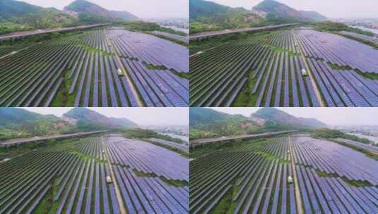 新能源太阳能光伏发电站江边航拍高清在线视频素材下载