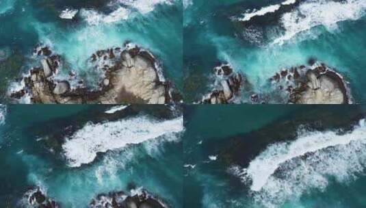 上帝视角俯拍海浪拍打礁石高清在线视频素材下载