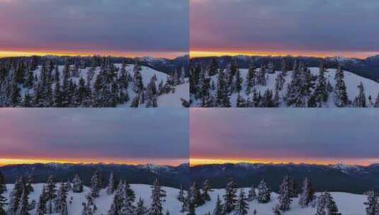 风景雪山和树木景观，多彩的日落天空。冬季高清在线视频素材下载