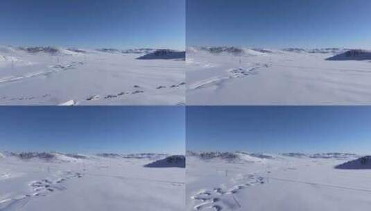 航拍新疆阿勒泰吉木乃草原石城雪原输电线路高清在线视频素材下载