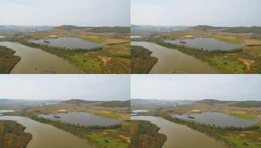 航拍吉林敦化市雁鸣湖湿地沼泽河流森林沼泽高清在线视频素材下载