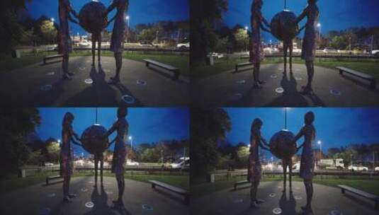 公园里举着地球仪的雕塑高清在线视频素材下载
