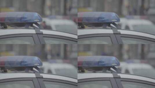 警车车顶上闪烁的警灯特写高清在线视频素材下载