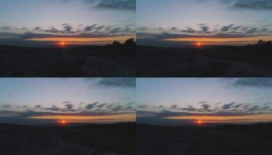 夕阳笼罩着黑暗的风景高清在线视频素材下载