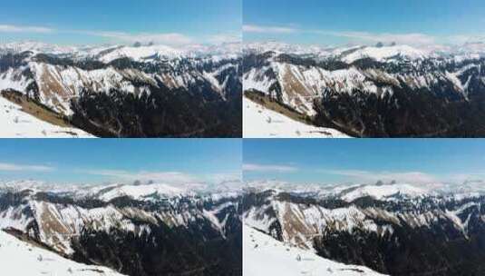 飞越白雪皑皑的山峰高清在线视频素材下载