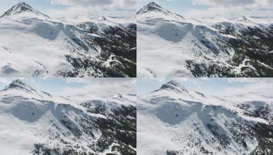 夹金山冬季航拍白雪覆盖山脊高清在线视频素材下载