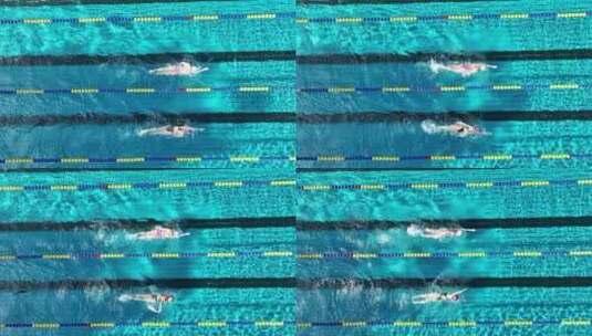 美女游泳运动员自由泳游泳池训练馆教学航拍高清在线视频素材下载