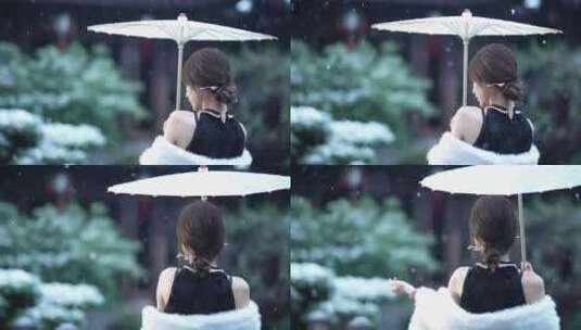 冬天下雪打油纸伞的旗袍美女背影高清在线视频素材下载