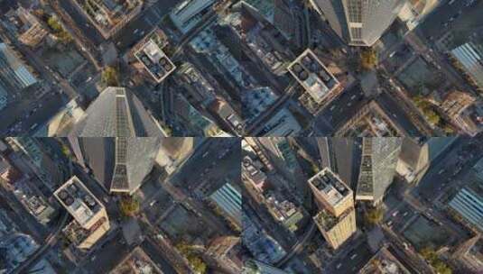 城市航拍无人机俯拍摩天大楼下车流行驶高清在线视频素材下载