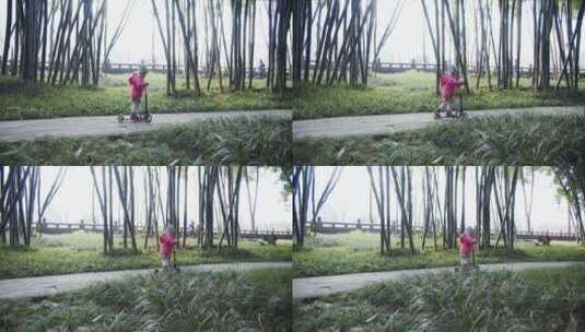 成都望江公园里玩滑板车的小女孩高清在线视频素材下载