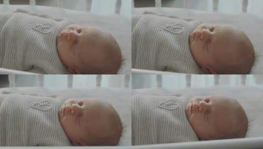 婴儿新生儿睡觉特写，熟睡的婴儿高清在线视频素材下载