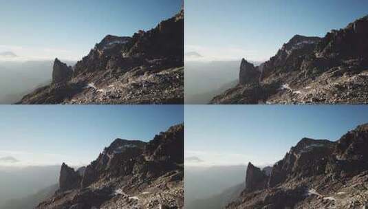 瑞士阿尔卑斯山岩石山峰，日出时观看。无人机鸟瞰图高清在线视频素材下载