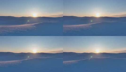 航拍4K冬日草原雪景日落高清在线视频素材下载