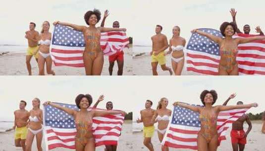 海滩上披着美国国旗奔跑的人高清在线视频素材下载