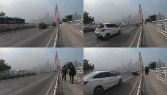 延时拍摄重庆东水门长江大桥的车流人流高清在线视频素材下载