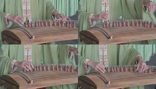 身穿中国传统汉服的女子弹奏古筝唯美画面高清在线视频素材下载