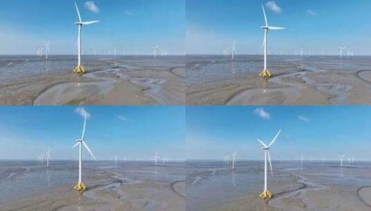 海滩上的风能风力发电场风车航拍高清在线视频素材下载