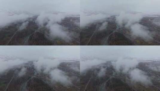 航拍秋天晨雾中的新疆禾木村风景高清在线视频素材下载