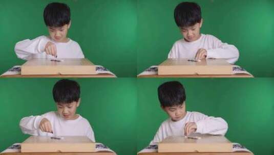 中国小男孩在下围棋高清在线视频素材下载
