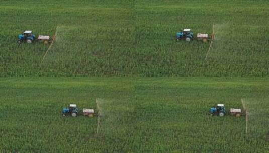 机器在田间喷施农药航拍高清在线视频素材下载