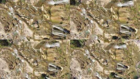 俯拍山谷悬崖流水瀑布高清在线视频素材下载