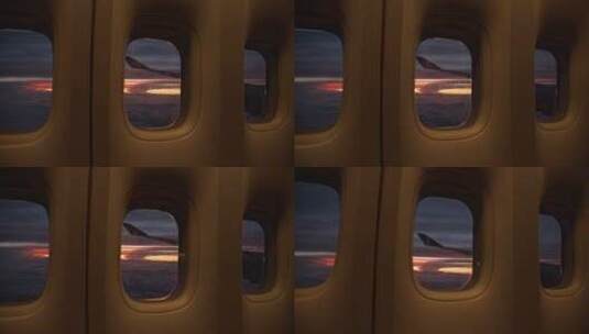 透过飞机窗户看日落高清在线视频素材下载