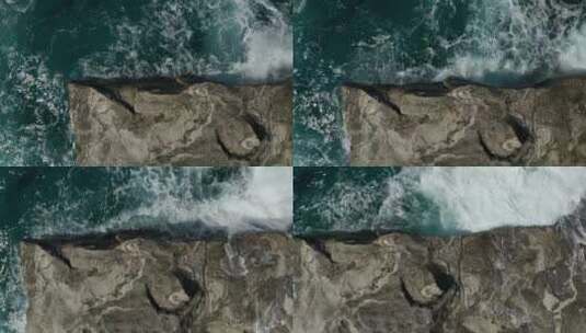 海浪拍打在石头上_顶部高空高清在线视频素材下载