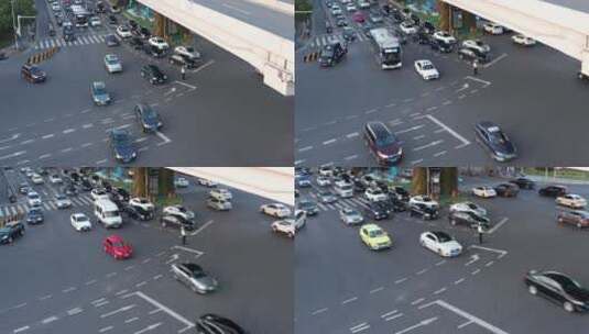 城市十字路口交警指挥车流高清在线视频素材下载