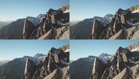瑞士阿尔卑斯山岩石山峰的日出景观。无人机高清在线视频素材下载