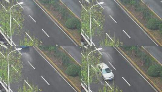 航拍城市暴雨天气交通道路行驶的汽车车流高清在线视频素材下载