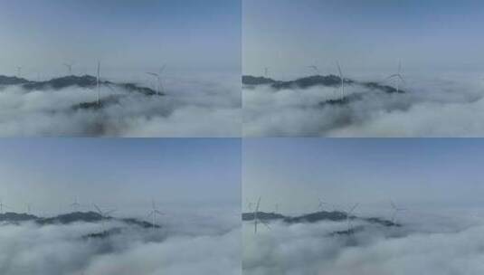 美丽云海山峰中的风力发电机组航拍高清在线视频素材下载