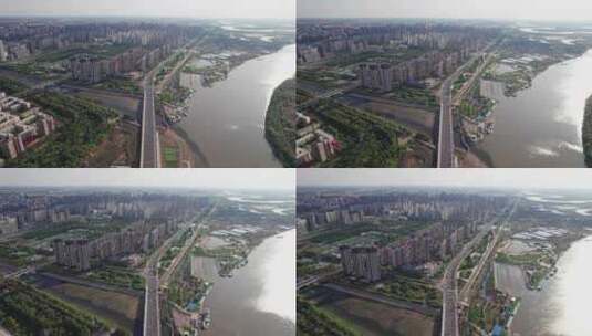 中国哈尔滨松花江边城市风光航拍高清在线视频素材下载