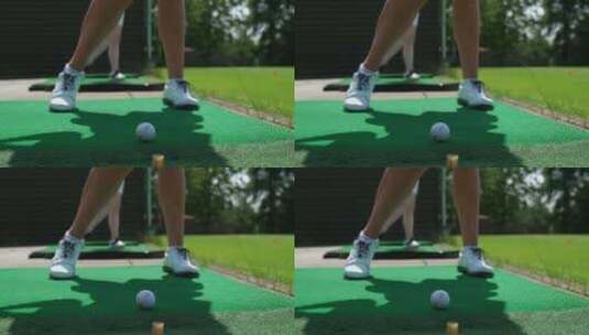 高尔夫球手的脚在球道上挥杆击球的低角度视高清在线视频素材下载