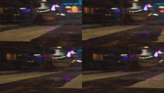 明亮的霓虹灯照亮亚洲城市街道的雨夜高清在线视频素材下载