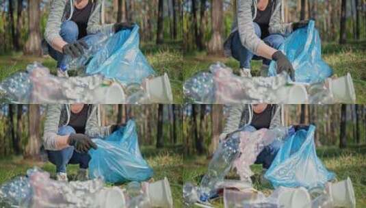 一个女人把躺在森林里的一堆垃圾收集到塑料高清在线视频素材下载