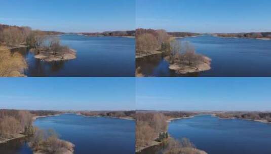 航拍蓝天下的湖泊高清在线视频素材下载